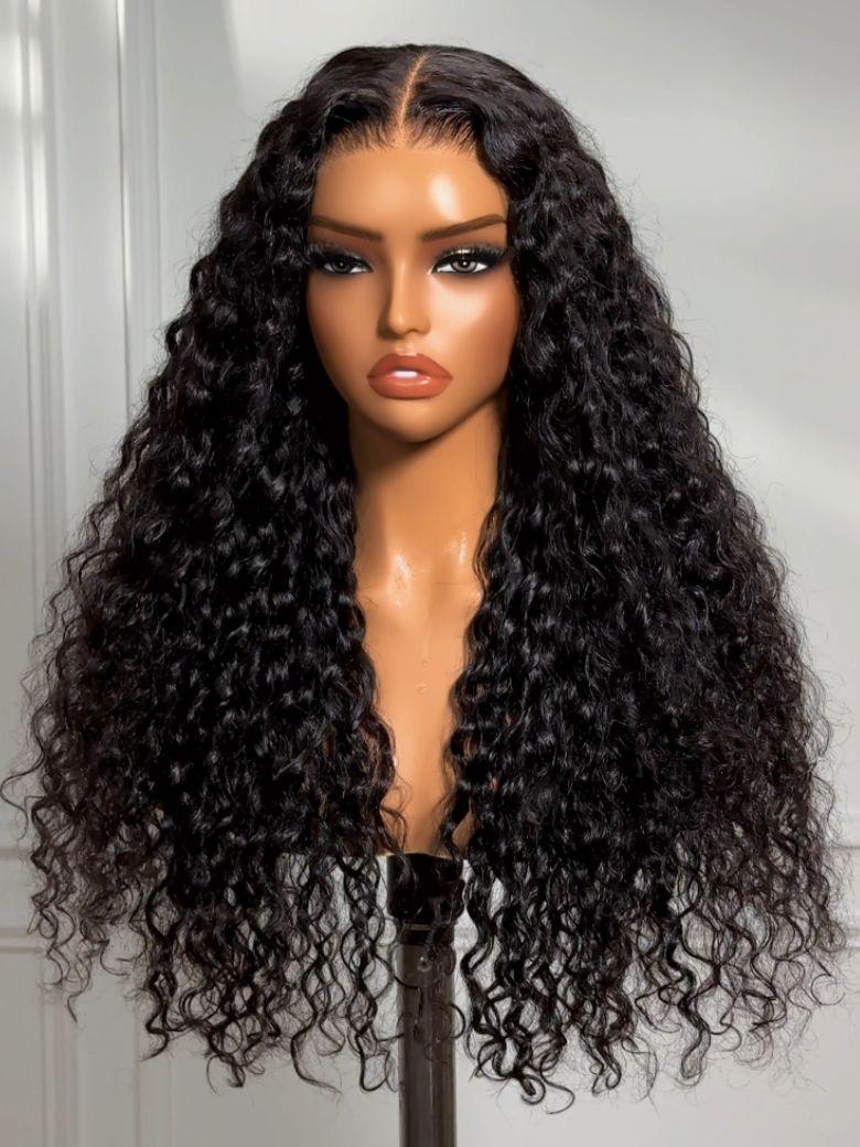 The UNice Bye Bye Knots 7x5 Lace Mixed Curls Wig with Invisi Drawstring product image shows a wig with long curly hair on a mann mann and 7x5, lace finish, drawstring.