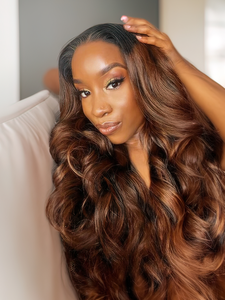 A model displays the UNice Balayage Highlight Human Hair Weave #FB30 Body Wave Hair Bundles 3 Bundle Deals, showing a model with long brown hair sitting on a couch.