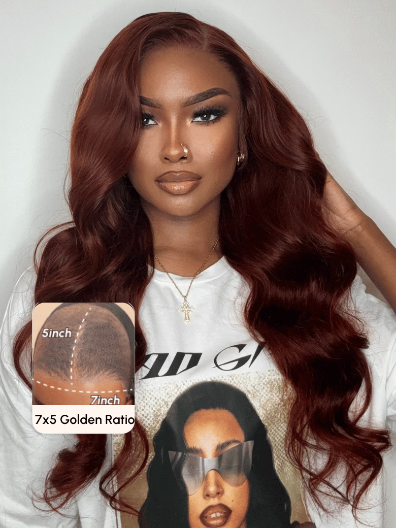 A model displays the UNice 7x5 Byebye Knots Lace Reddish Brown Body Wave Bleached Knots Blend Seamless Wig, showing a model with long red hair and a white shirt and body.