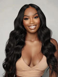 A model displays the UNice InvisiBlend V part Natural Black Glueless Body Wave Wig Protect Your Natural Hair, showing a woman wearing a long black wig and body wave.