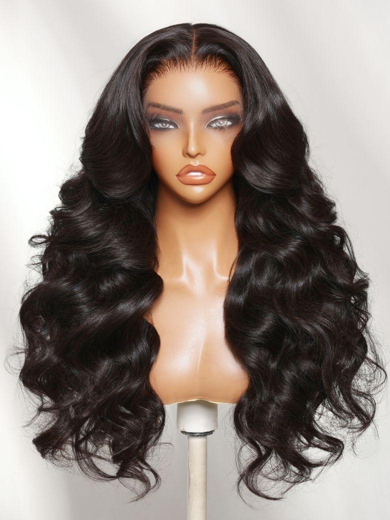 The UNice 360 HD Lace Pre-plucked Luxury Raw Virgin Hair Natural Black Body Wave Wig visual image position 2 shows a wig with long wavy hair | body wave texture, natural.