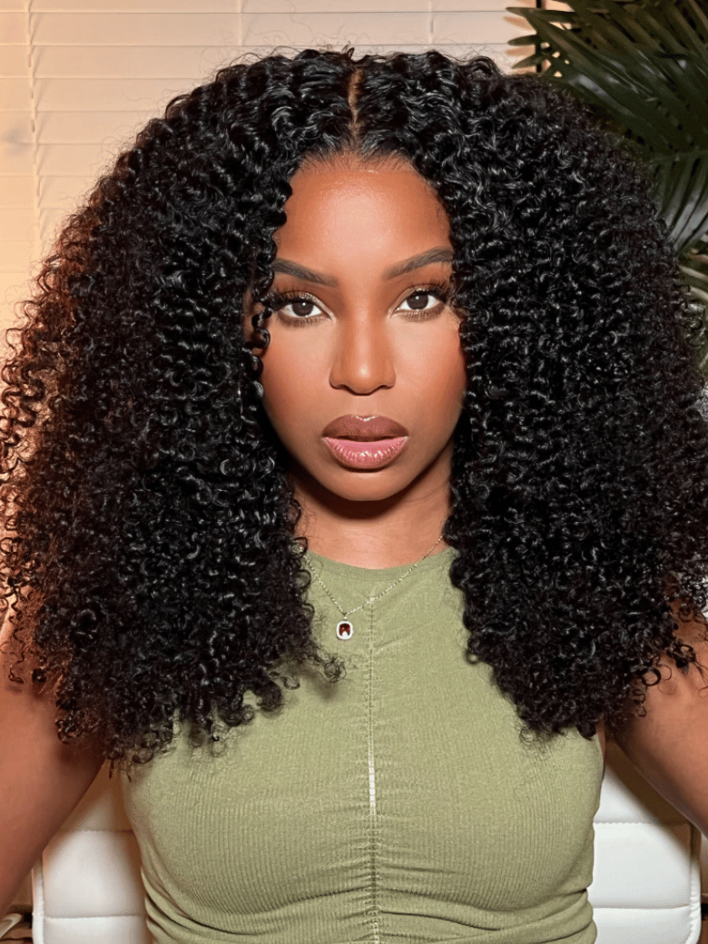 A model displays the UNice Hot Lace Part Wig Breathable Kinky Curly wig Natural Hairline, showing a model with long curly hair sitting on a couch and kinky curly.