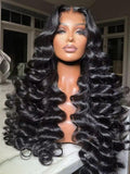 The UNice 13x4 Pre-Everything Wig Lace Frontal Natural Black Loose Deep Wave 150% Density visual image position 2 shows a woman wearing a wig with long curly hair | deep.