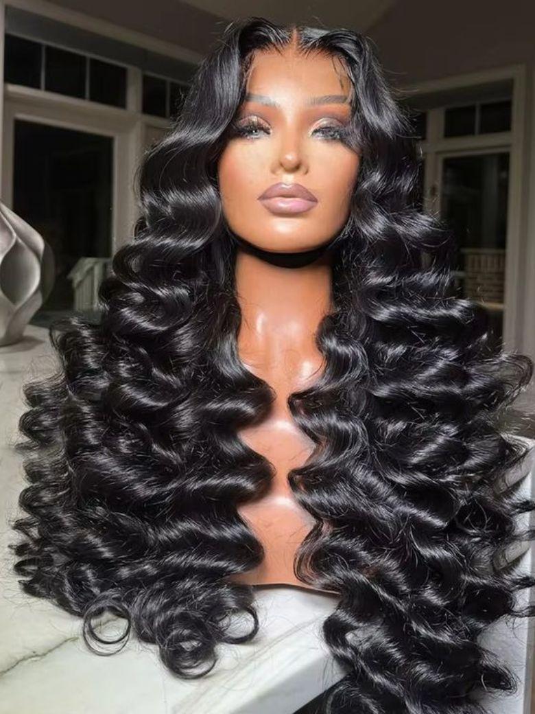 The UNice 13x4 Pre-Everything Wig Lace Frontal Natural Black Loose Deep Wave 150% Density visual image position 2 shows a woman wearing a wig with long curly hair | deep.