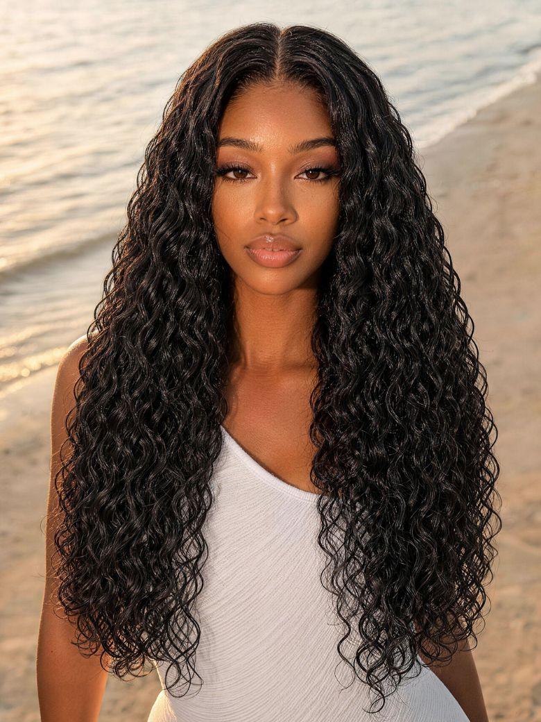 A model displays the UNice Bye Bye Slip 7x5 Lace Warm Brown with Beige Blonde Ribbon Highlights Layered wig, showing a model with blonde hair and a black top.