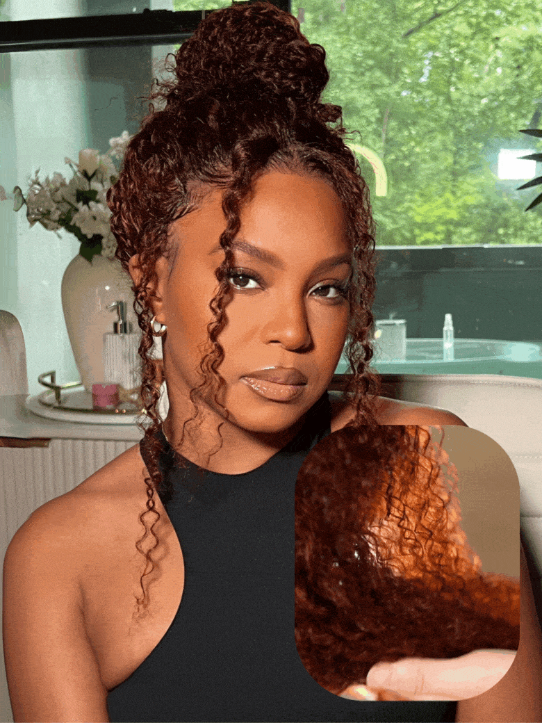 A model displays the UNice 13x4/7x5 Glueless Lace Bye Bye Knots Wig Reddish Brown Curly Wig With Bleached, showing a woman holding a piece of cake in her hands and curly.