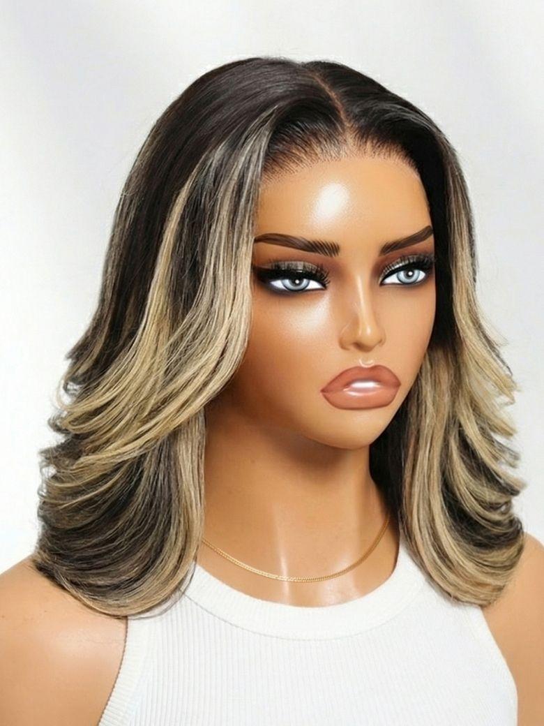 A model displays the UNice 7x5 Bye Bye Slip Lace Dark Brunette with Ash Blonde Highlight Layered Wavy Bob, showing a model with long blonde hair wearing a black.