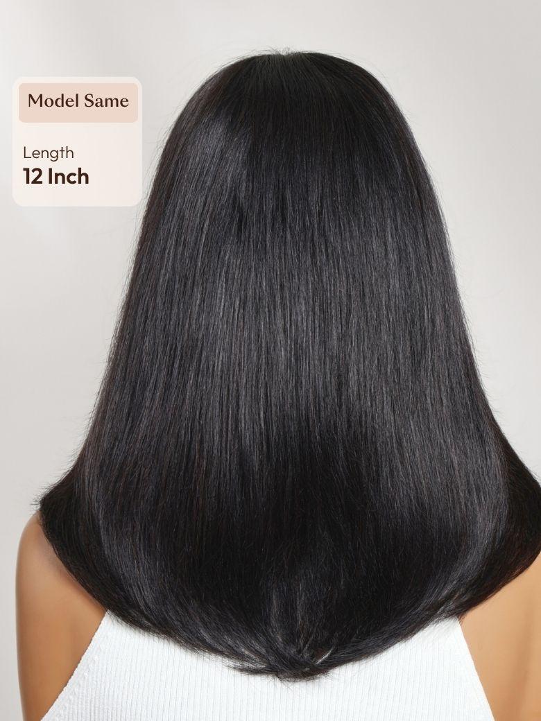 The UNice 7x5 Bye Bye Slip Lace Black Blowout Layered Bob Wig with Curtain Bang visual image position 10 shows a model with long black hair and a white top | visible.