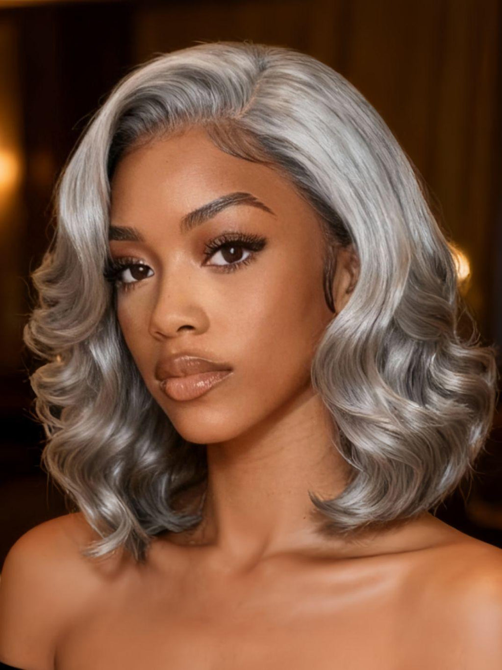 A model displays the UNice Boss-Vibe Salt and Pepper Blowout Layered Bob Glueless Wig 6.5x1.5 Side Part, showing a model with grey hair and a black dress and 5x1.