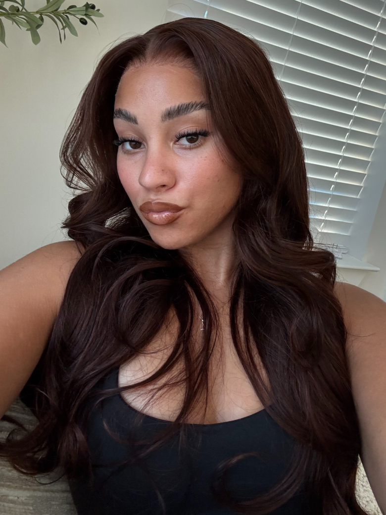 A model displays the UNice Glueless Auburn/Red Brown 13x4 Pre-Everything & 7x5 Lace Wig Loose Wave, showing a model with long brown hair and a black top and loose wave.