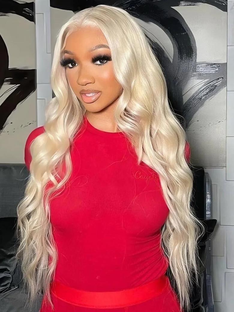 A model displays the UNice 3Pcs 613 Blonde Human Hair Weft Body Wave Bundles, showing a model with long blonde hair wearing a red top and body wave texture, 613 blonde.