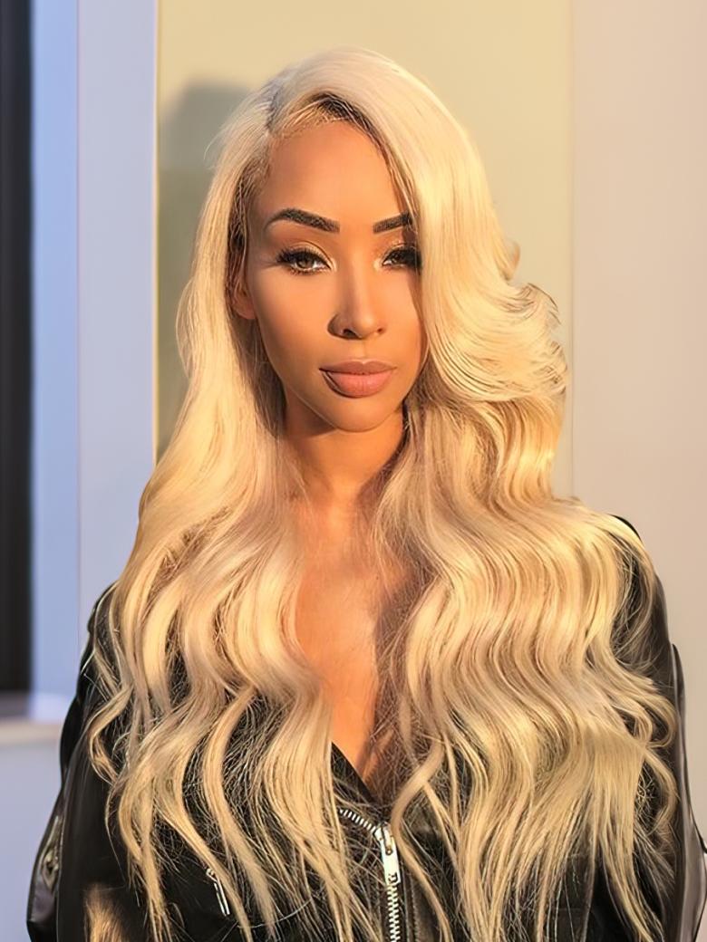 A model displays the UNice Hair 613 Blonde Virgin Human Hair Wave 4 Bundles Body Wave Hair Weft, showing nicka is seen in a photo with her long blonde hair and body wave.