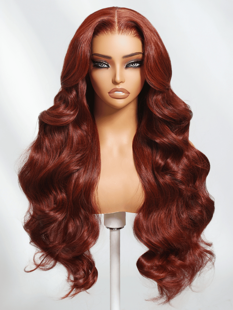 The UNice 7x5 Bye Bye Knots Wig Glueless Lace Reddish Brown Body Wave Bleached Knots Wig image highlights OP, a wig with long red hair and body wave texture, reddish.