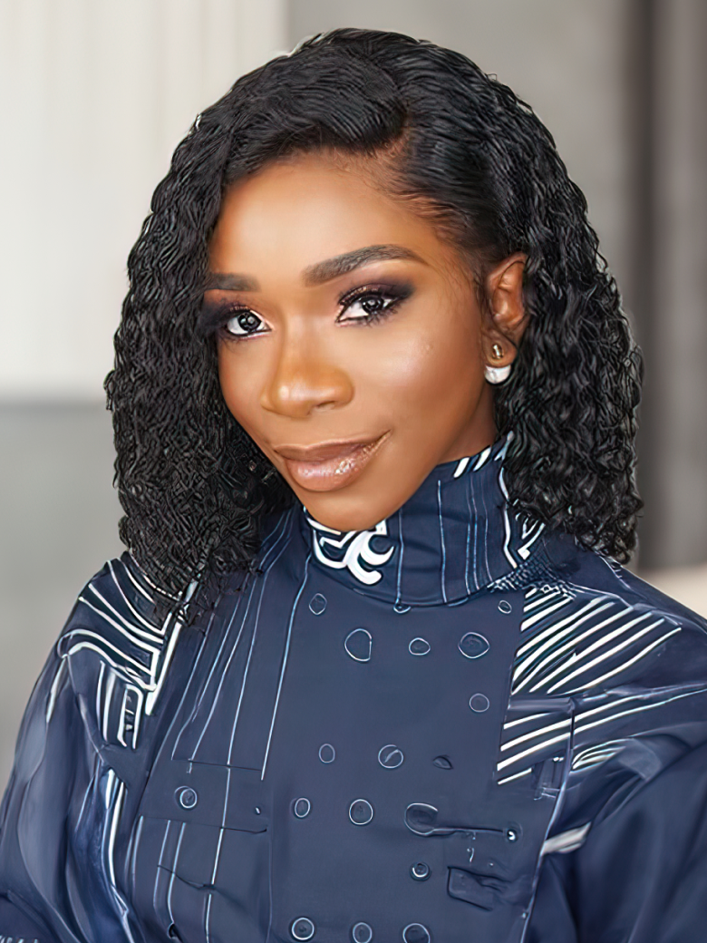 A model displays the UNice Brazilian Jerry Curly Virgin Hair 4pcs/pack, showing a model with long curly hair wearing a blue jacket and jerry curl texture, curly texture.