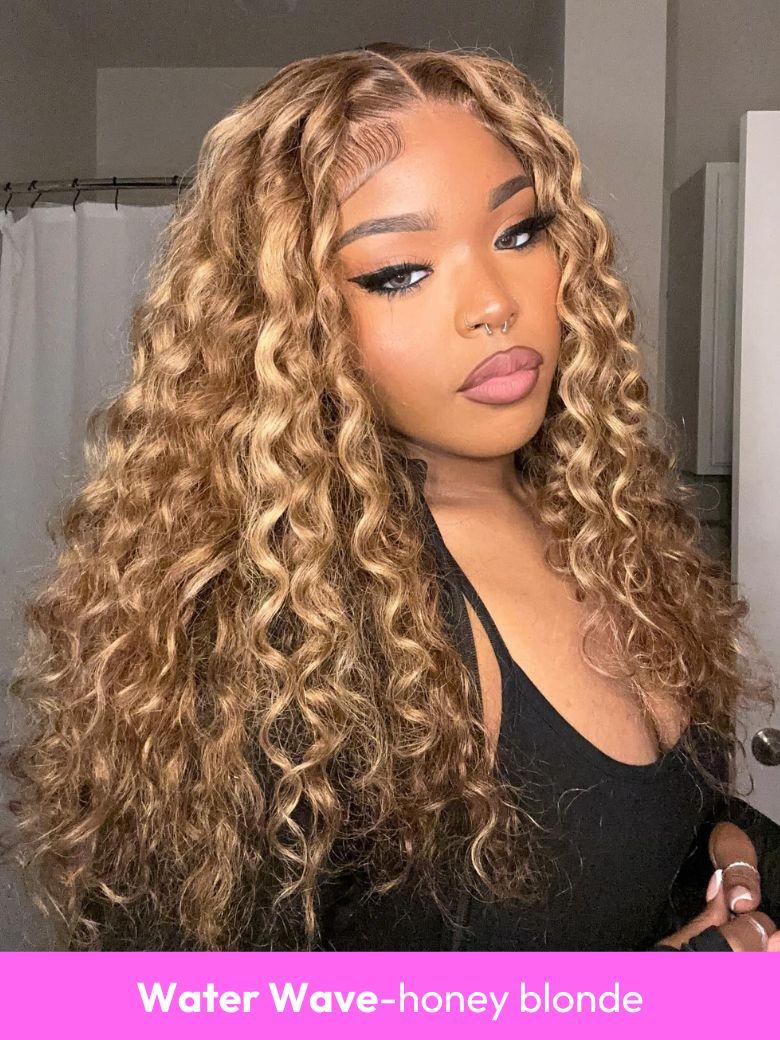 A model displays the UNice 13x4 Glueless Lace Front Collection Wig Virgin Human Hair Wig, showing a model with long curly hair and a black top and 13x4, glueless wear.