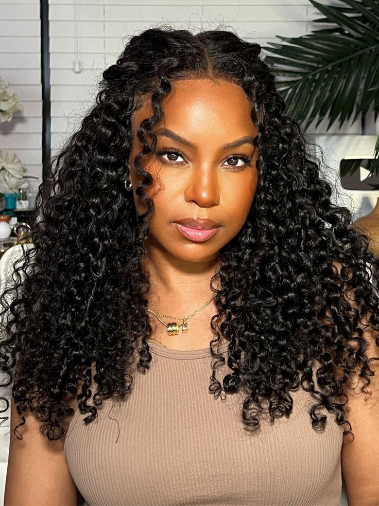 A model displays the UNice 200% Density 7x5 Bye Bye Knots Wig Glueless Lace Jerry Curly Wig With Bleached, showing a model with long curly hair and a brown top and jerry.