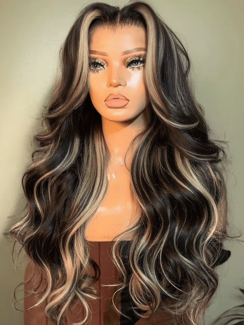 A model displays the UNice 7x5 Bye Bye Slip Lace Loose Wave Butterscotch Highlights Brown with Free Face wig, showing a model with long wavy hair wearing a brown.