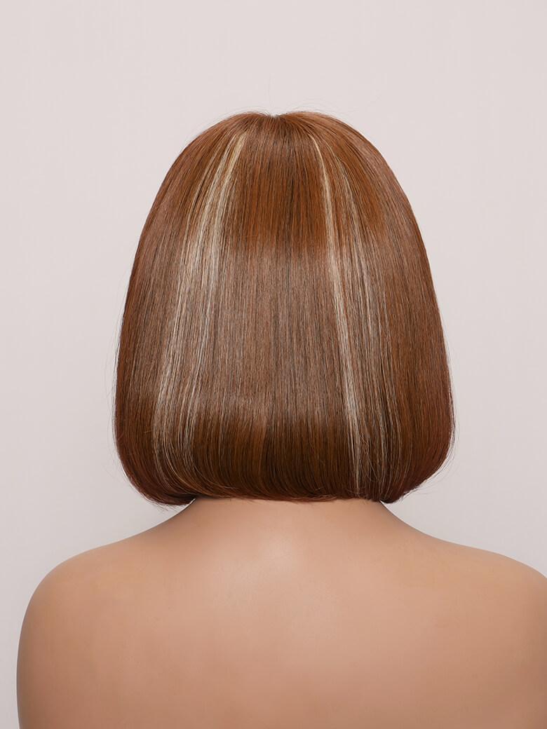 A model displays the UNice AMARA -12" MONO STRAIGHT HUMAN HAIR WIG, showing a model with a short bob bob bob bob bob bob bob bob bob bob bob bob bob bob bob bob.