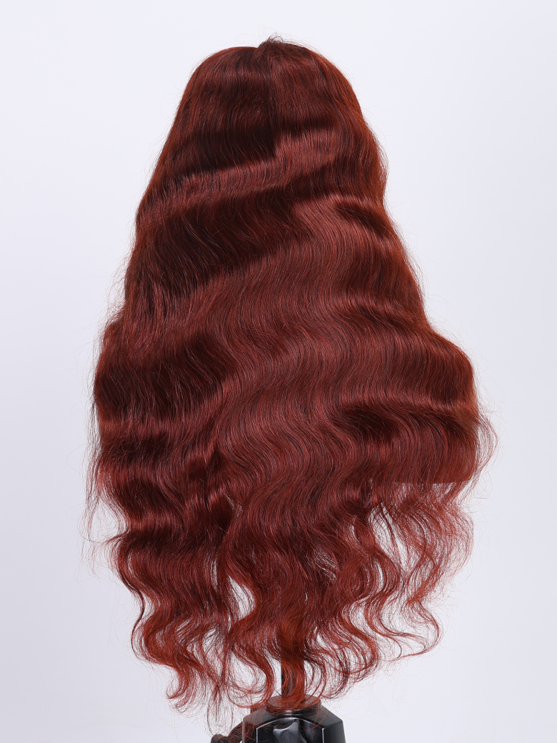 The UNice 7x5 Byebye Knots Lace Reddish Brown Body Wave Bleached Knots Blend Seamless Wig product image shows a wig with a red hair color and body wave texture, reddish.