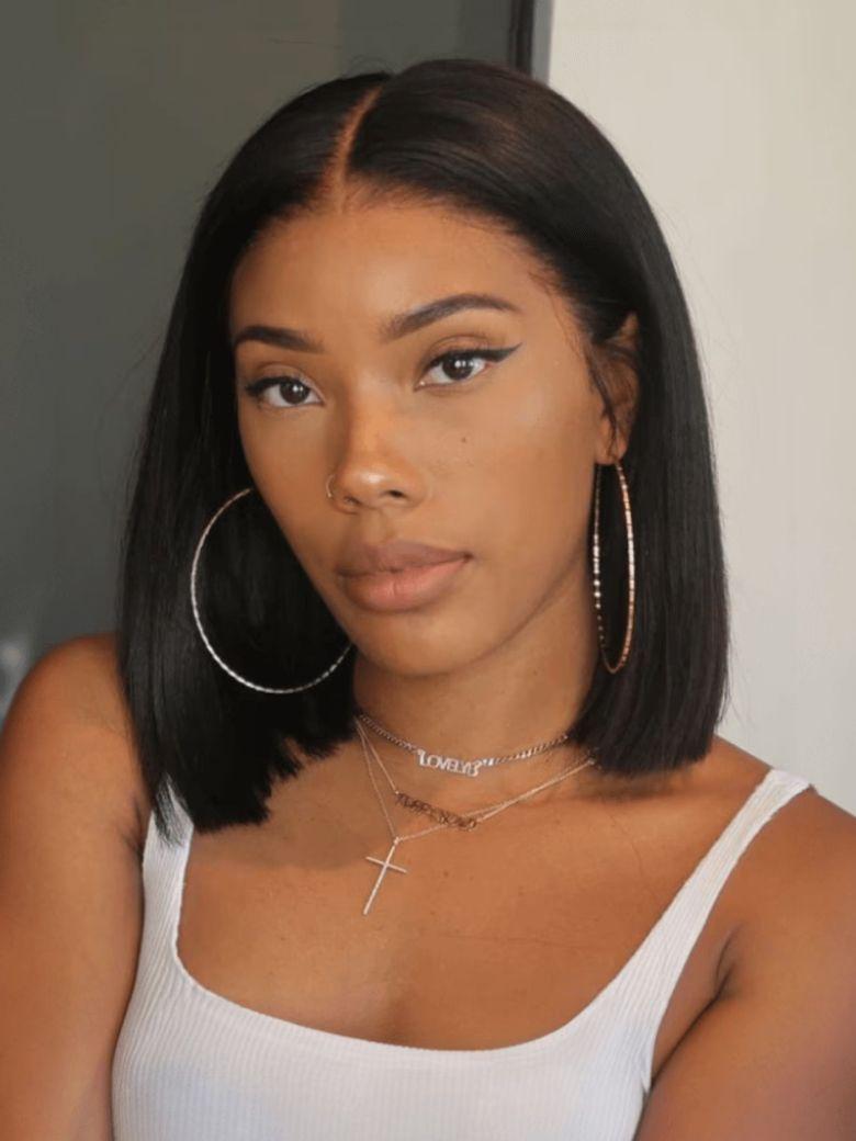 The UNice Invisi Drawstring Put On And Go Easy Daily Style Glueless Lace Bleached Knots wig visual image position 4 shows a model with long black hair wearing a white.
