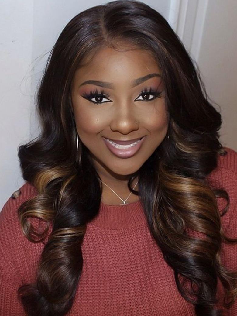 A model displays the UNice Chestnut Brown Ombre Body Wave 1 Piece Human Hair Bundle, showing a model with long brown hair and a red sweater and body wave texture, ombre.