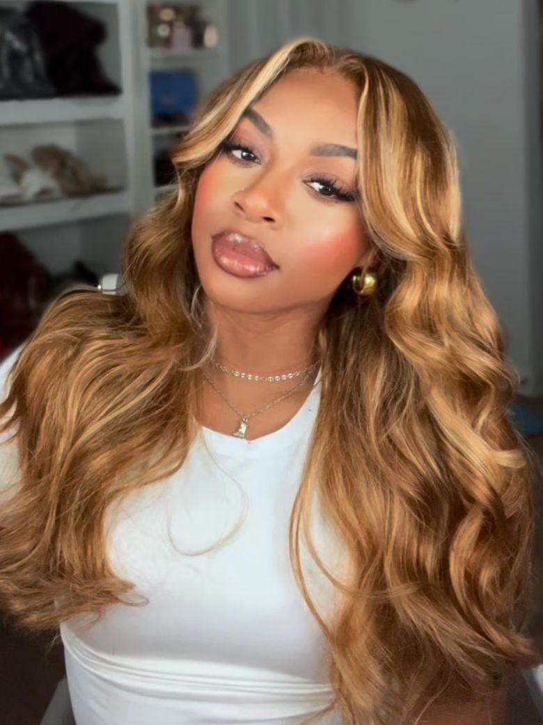 A model displays the UNice 24''-26'' UNice Bye Bye Knots Wig Pre-Cut 7x5 Glueless Lace Honey Blonde Body, showing a model with long blonde hair and a white shirt.