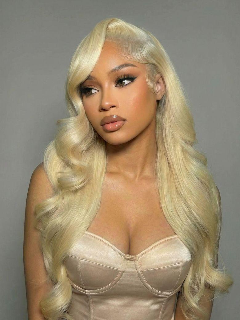 A model displays the UNice Full Lace 100% Handmade Blonde Body Wave & Straight Pre Plucked human hair wig, showing a blonde wig with long hair and a long, wavy and body.