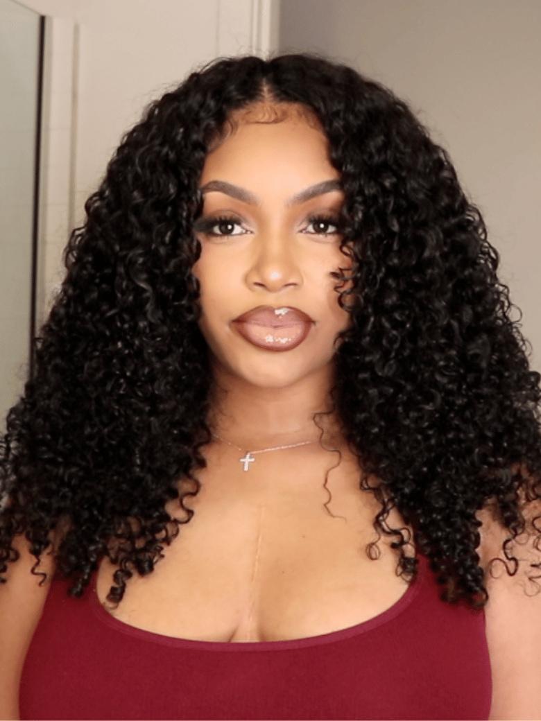 A model displays the UNice InvisiBlend V part Jerry Curly& Kinky Curly Wig Invisi Drawstring Human Hair, showing a model with long curly hair and a red top and kinky.