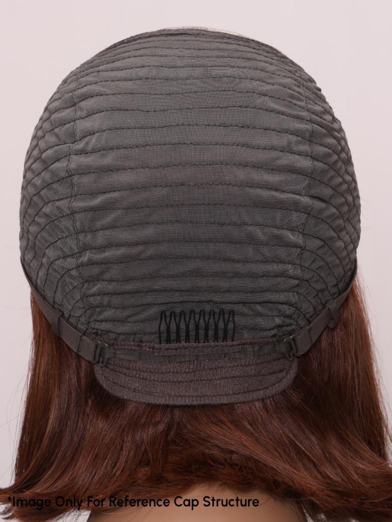 A model displays the UNice AMARA -12" MONO STRAIGHT HUMAN HAIR WIG, showing a model with long brown hair wearing a hat and straight texture.