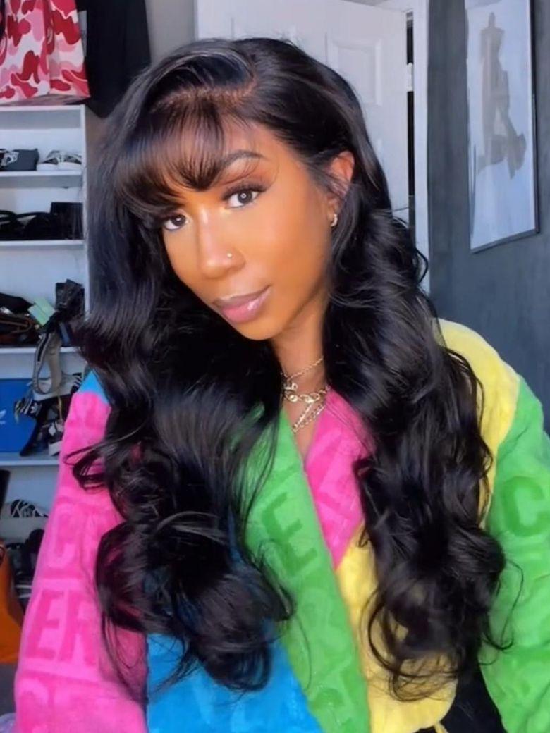 The UNice Stylish Choice UNice 13x4 Pre-Everything Side-Part Fluffy Loose Wave Wig With visual image position 4 shows a model with long black hair wearing a colorful.