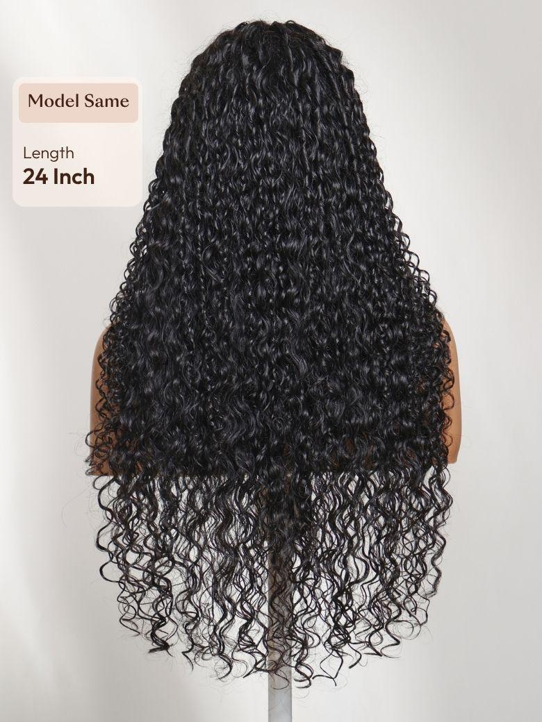 A model displays the UNice 7x5 Bye Bye Slip Lace Black Defined Mixed Curly Glueless Wig with Invisi, showing a full wig with curly hair and curly texture, 7x5, glueless.