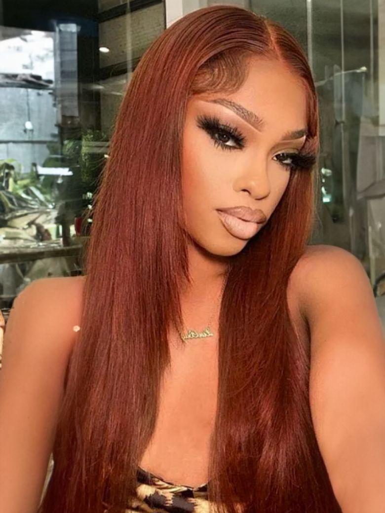 A model displays the UNice Ins Only 7x5 Bye Bye Knots Reddish Brown Kinky Curly & Straight & 13x4 wig, showing a model with long red hair and a gold dress and loose wave.