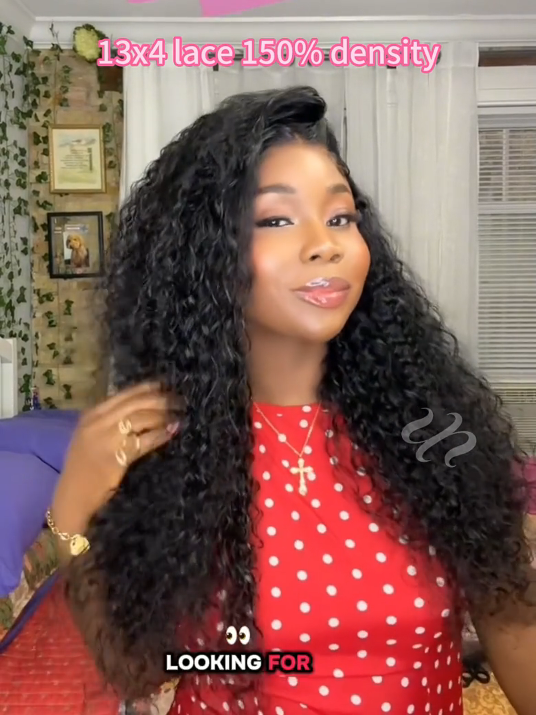 A model displays the UNice 7x5 Bye Bye Knots & 13x4 Pre-Everything Lace Frontal Natural Black & Golden, showing a model with long curly hair wearing a red dress.