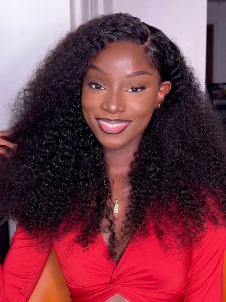 A model displays the UNice 200% Density HD Glueless 5x5 Lace Natural Afro Kinky Curly Human Hair Wig, showing a model with long curly hair wearing a red top and kinky.