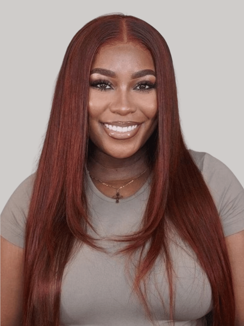 A model displays the UNice Dark Auburn Straight Remy Human Hair 3 Bundles With Closure Deal, showing a model with long red hair and a grey shirt and straight texture.