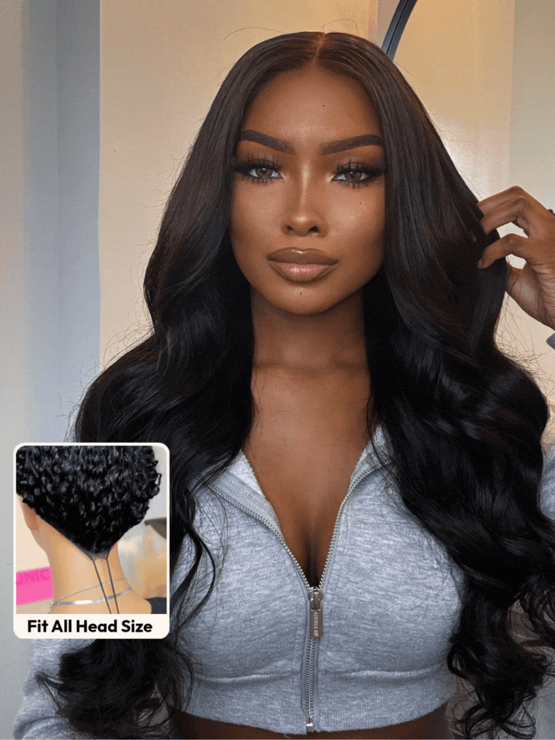 A model displays the UNice InvisiBlend V part Natural Black Glueless Body Wave Wig Protect Your Natural Hair, showing a model with long hair and a gray shirt and body.