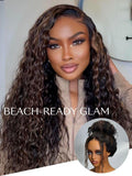 A model displays the UNice Bye Bye Knots 7x5 Lace Water Wave Black Wig With Golden Brown Highlights &, showing a model with long curly hair and a brown jacket and water.