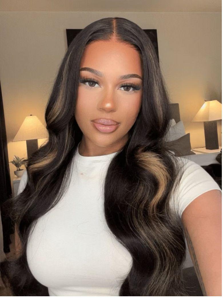 A model displays the UNICE $89 Surprise Box Randomly Get 22''-30'' 13x4 Pre-Everything wig Value $329-$499, showing a model with long black hair and a white top and 13x4.