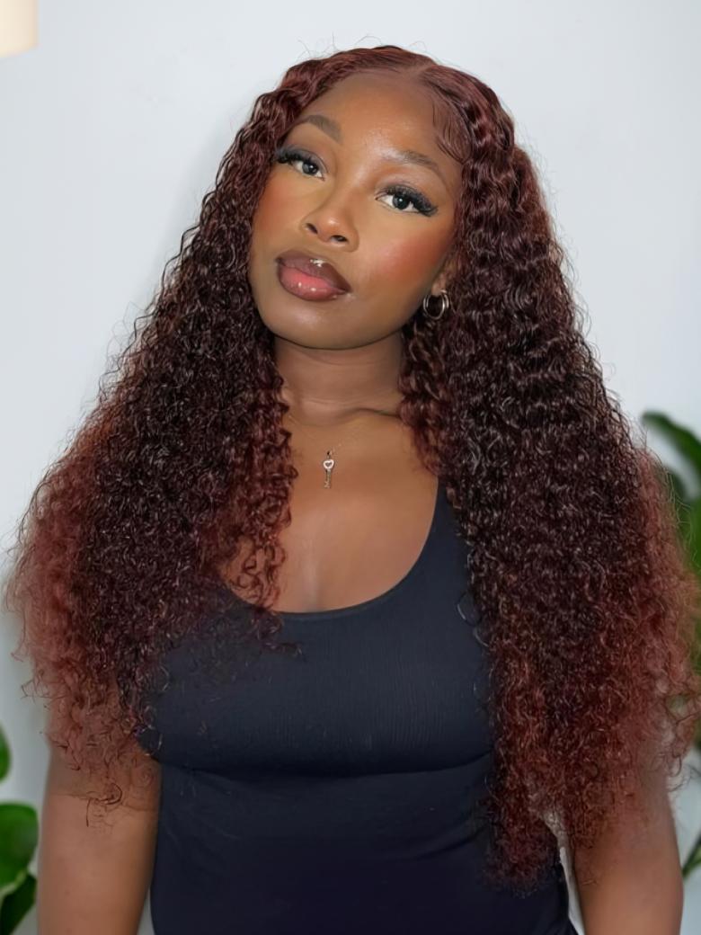 A model displays the UNice 13x4/7x5 Glueless Lace Bye Bye Knots Wig Reddish Brown Curly Wig With Bleached, showing a model with long curly hair wearing a black top.