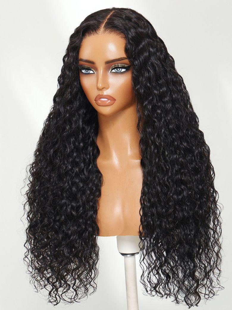 The UNice Bye Bye Knots 7x5 Lace Mixed Curls Wig with Invisi Drawstring product image shows a long curly wig with a long, wavy hair and 7x5, lace finish, drawstring fit.