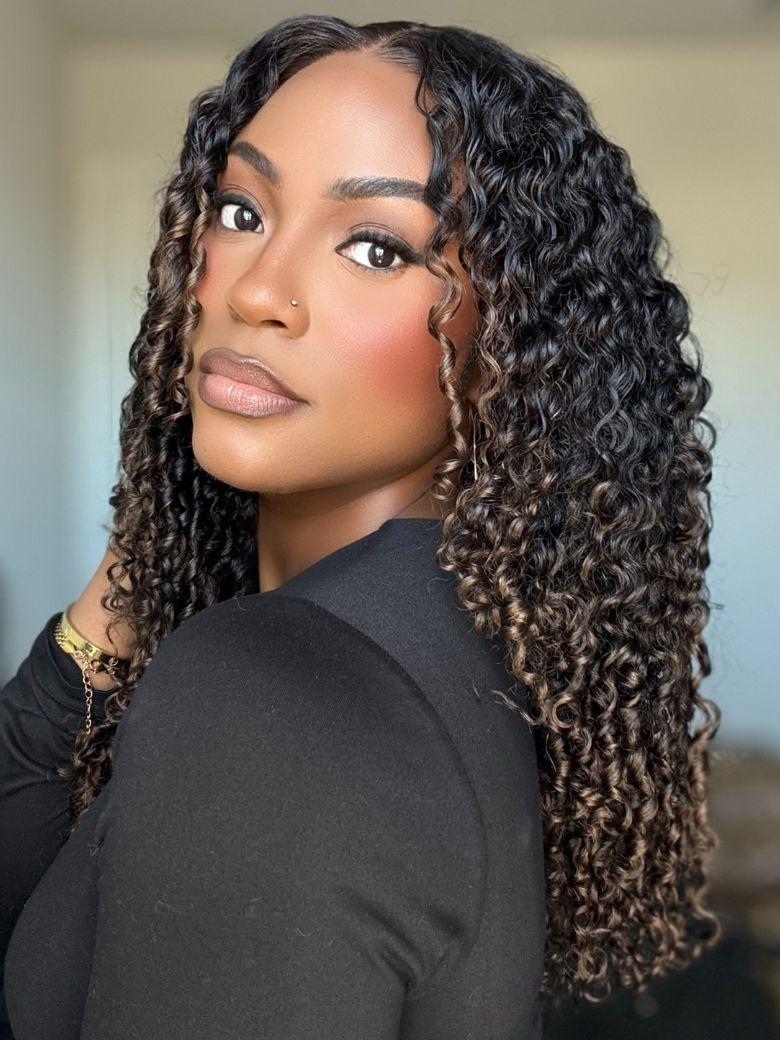 A model displays the UNice With Drawstring Summer Color 7x5 Bye Bye Slip Glueless Lace Black to Chestnut wig, showing a model with long curly hair wearing a black top.