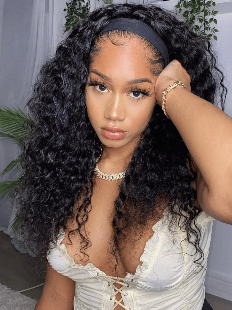 A model displays the UNice Put On And Go Water Wave Human Hair Headband Glueless Wig, showing a model with long curly hair wearing a headband and water wave texture.
