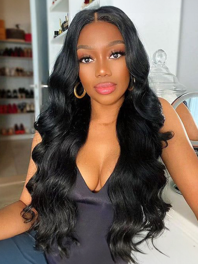 A model displays the UNice 7x5 Bye Bye Knots Body Wave Wig Pre Cut Lace Pre Plucked Hairline Put On and, showing a woman wearing a black wig and a black dress and body.