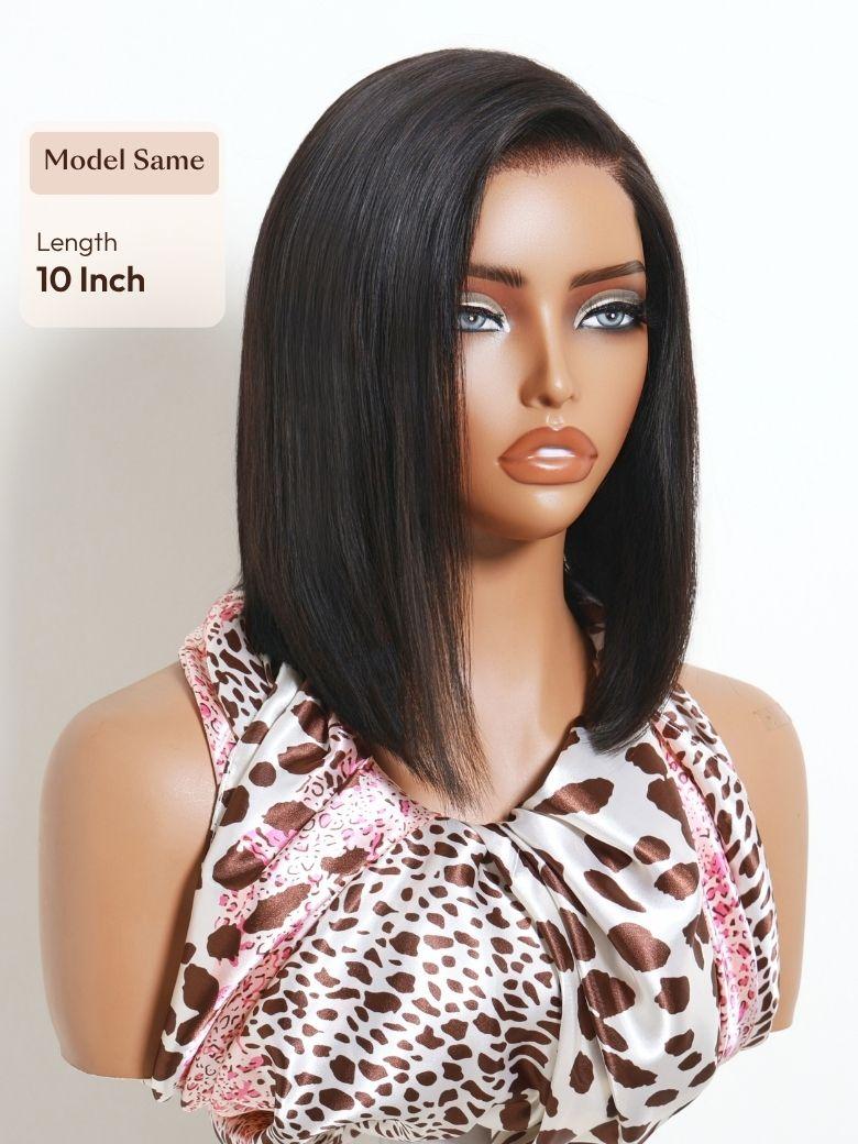 A model displays the UNice Bye Bye Slip 6x4 Lace Glueless Natural Black Side Part Sleek Blunt Cut Bob Wig, showing a manne wig with a leopard print top and straight.