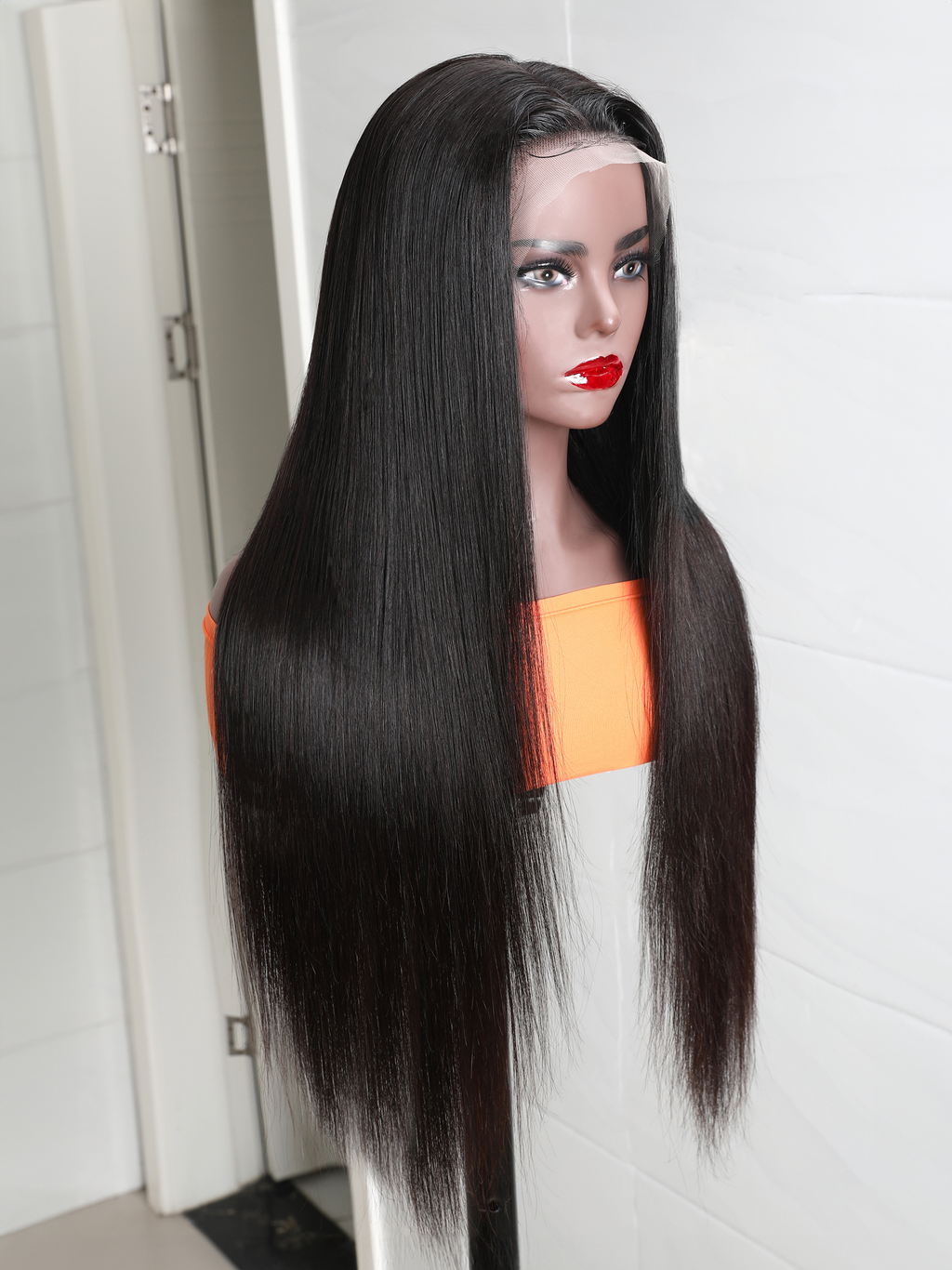 The UNice 280% Density 13x4 HD Lace wig Curly Lace Front wig Human Hair UNice product image shows a manne with long hair and a red lipstick and curly texture, 13x4.
