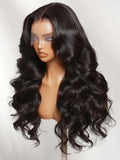 A model displays the UNice 360 HD Lace Pre-plucked Luxury Raw Virgin Hair Natural Black Body Wave Wig, showing a wig with long wavy hair and body wave texture, natural.