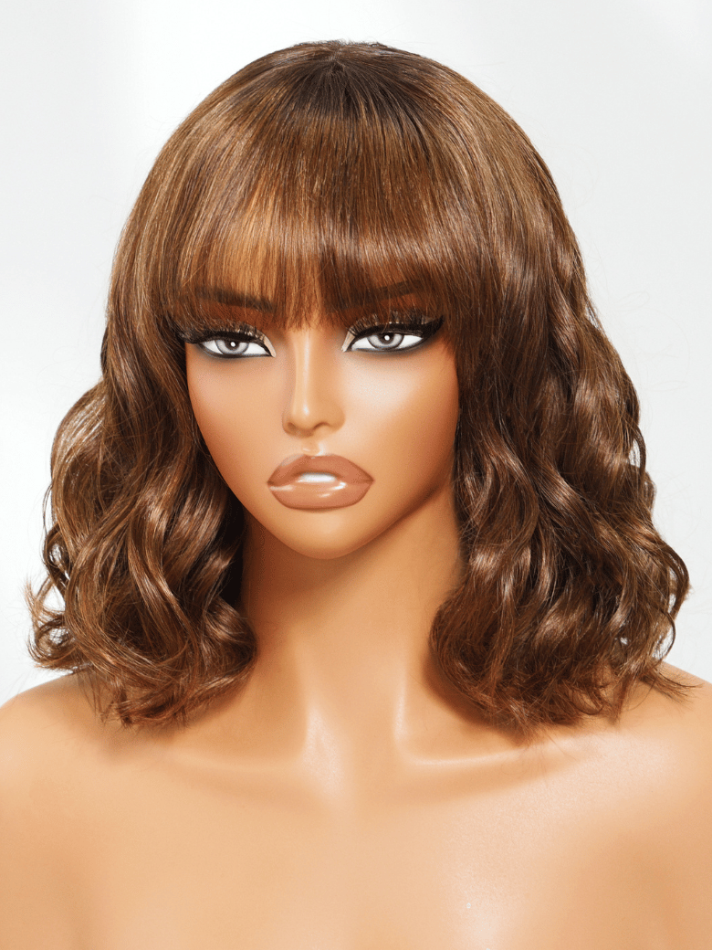 A model displays the UNice Chic Brown Bob Wig 4x2 Lace with Bangs Soft Waves Effortless Style Wig, showing a wig with bangs and bangs on top and 4x2, lace finish.