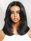 A model displays the UNice 7x5 Bye Bye Slip Lace Black Blowout Layered Bob Wig with Curtain Bang, showing a model with long black hair and a white top and 7x5, lace.