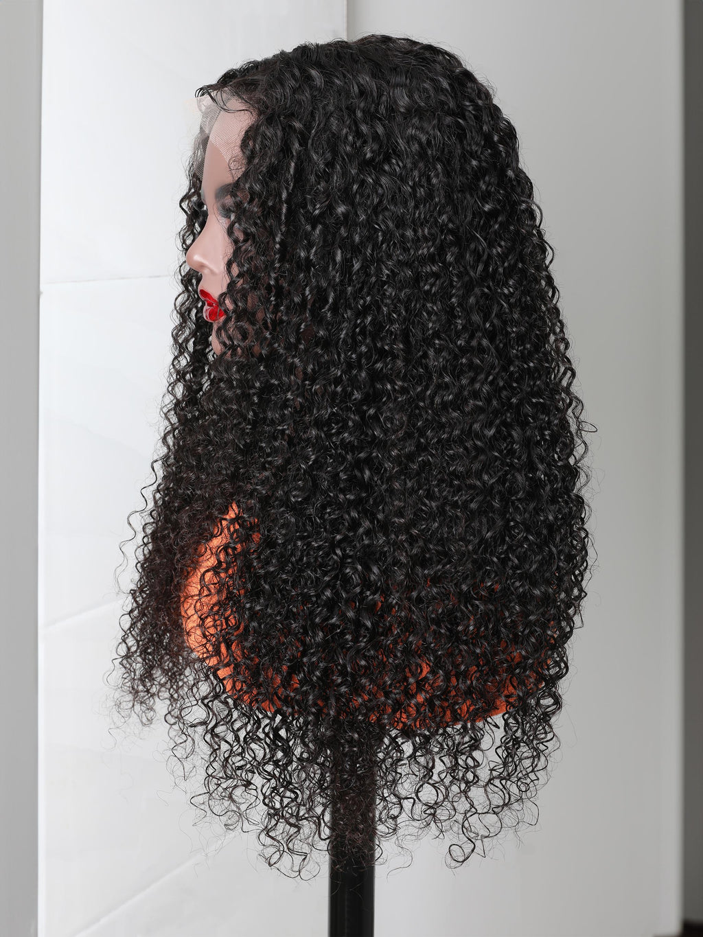The UNice 280% Density 13x4 HD Lace wig Curly Lace Front wig Human Hair UNice visual image position 9 shows a wig with curly hair on a mann | curly texture, 13x4.