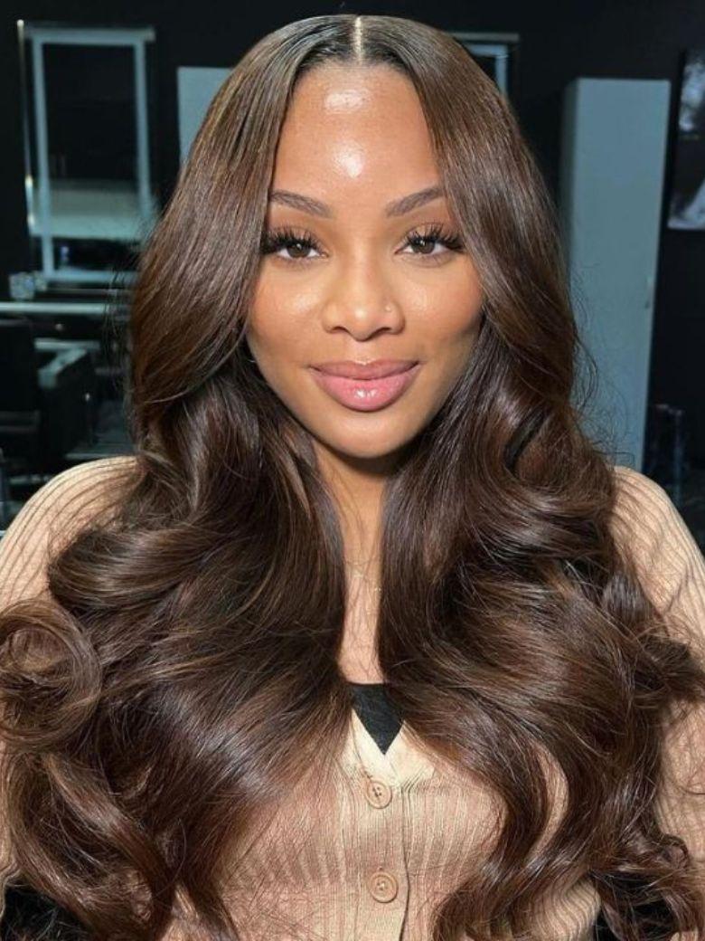 A model displays the UNice 13x4 Pre-Everything Lace Frontal Espresso Brown With Highlights Loose Wave, showing a model with long brown hair and a brown sweater and loose.